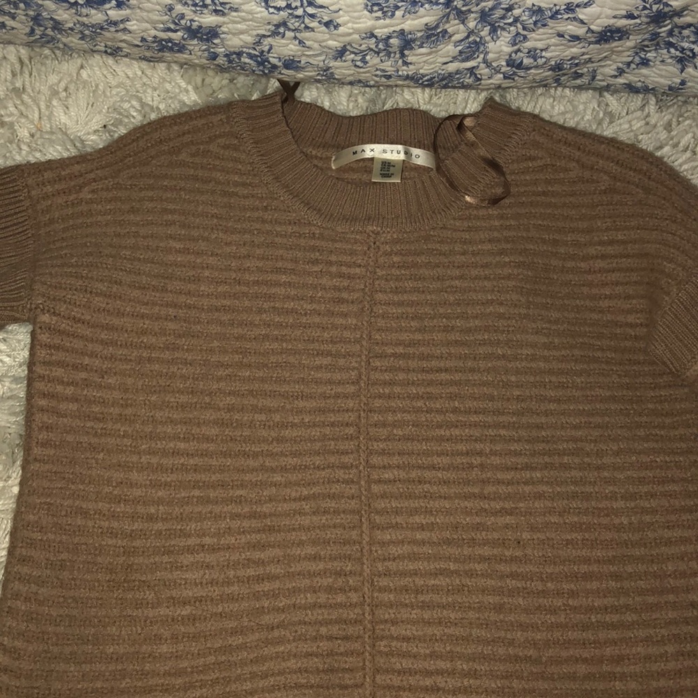 light brown sweater